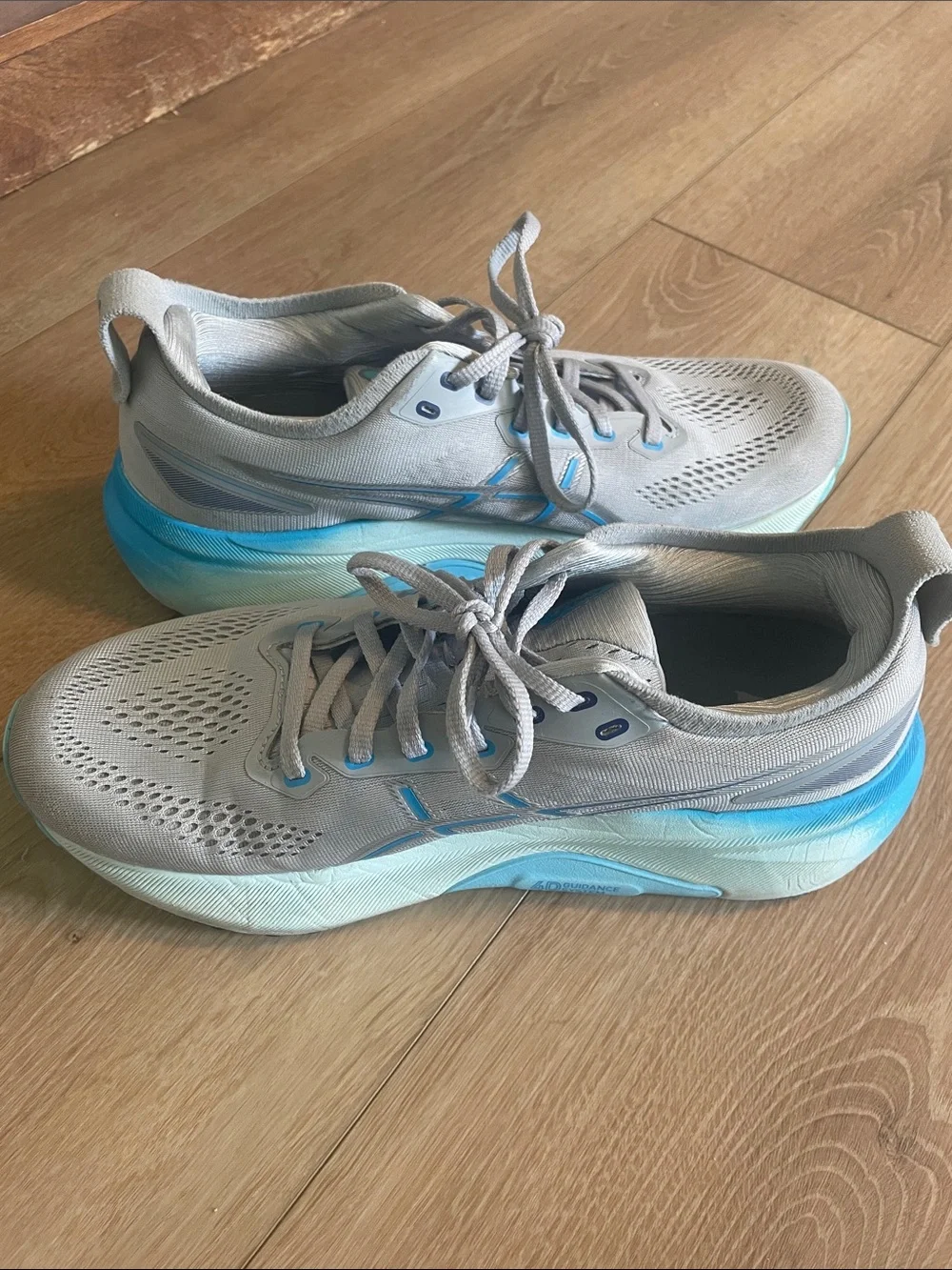 Asics Gel-Kayano 31 Light Gray Running Shoes with Blue Accents